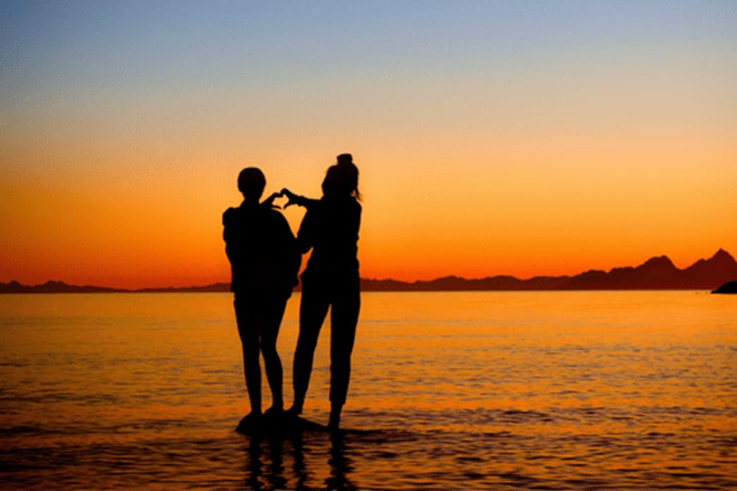 Zedric’s Wellness. Are You Ignoring Your Emotional Self-Care? Image of two people at the beach.